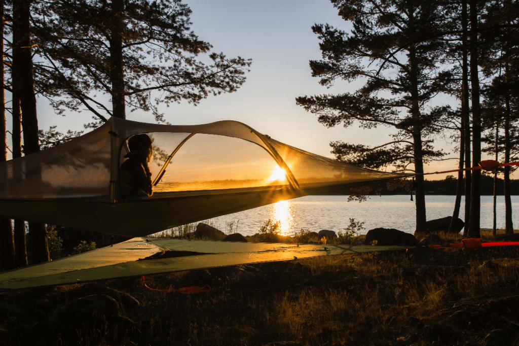 women inside hammock bug net